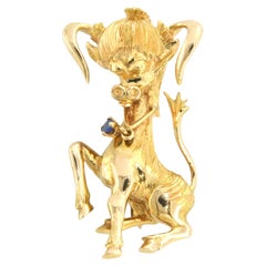 Brooch in the shape of a horse set with sapphire 18k gold