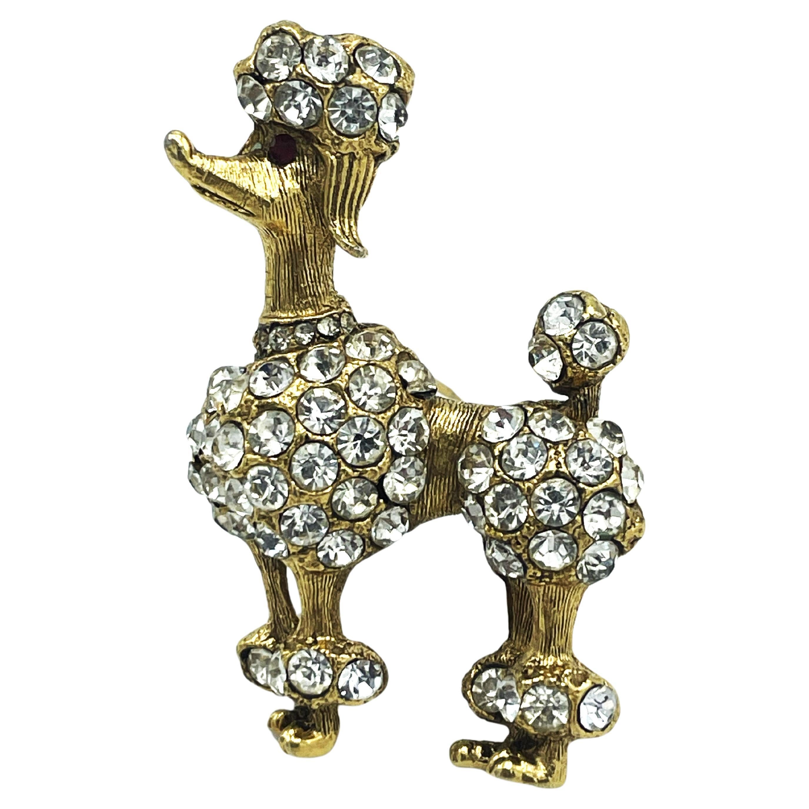 Brooch in the shape of a proud poodle, set with rhinestones, signed BSK copyrigh For Sale