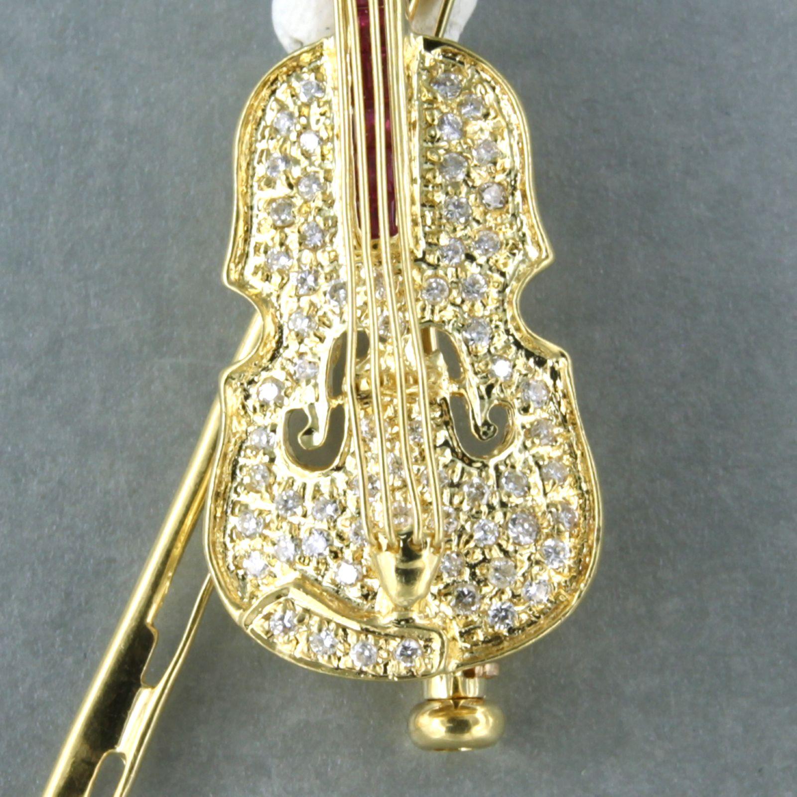 Modern brooch in the shape of a violin set with ruby brilliant diamonds 18k gold