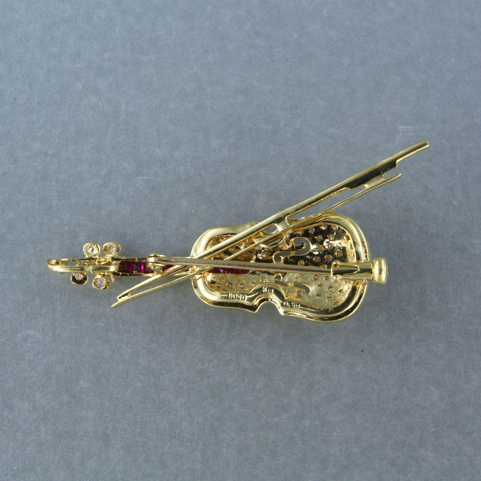 brooch in the shape of a violin set with ruby brilliant diamonds 18k gold 1