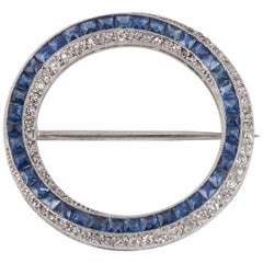 Open Circle Brooch in Platinum, Diamonds & Ceylon Sapphires, English circa 1960