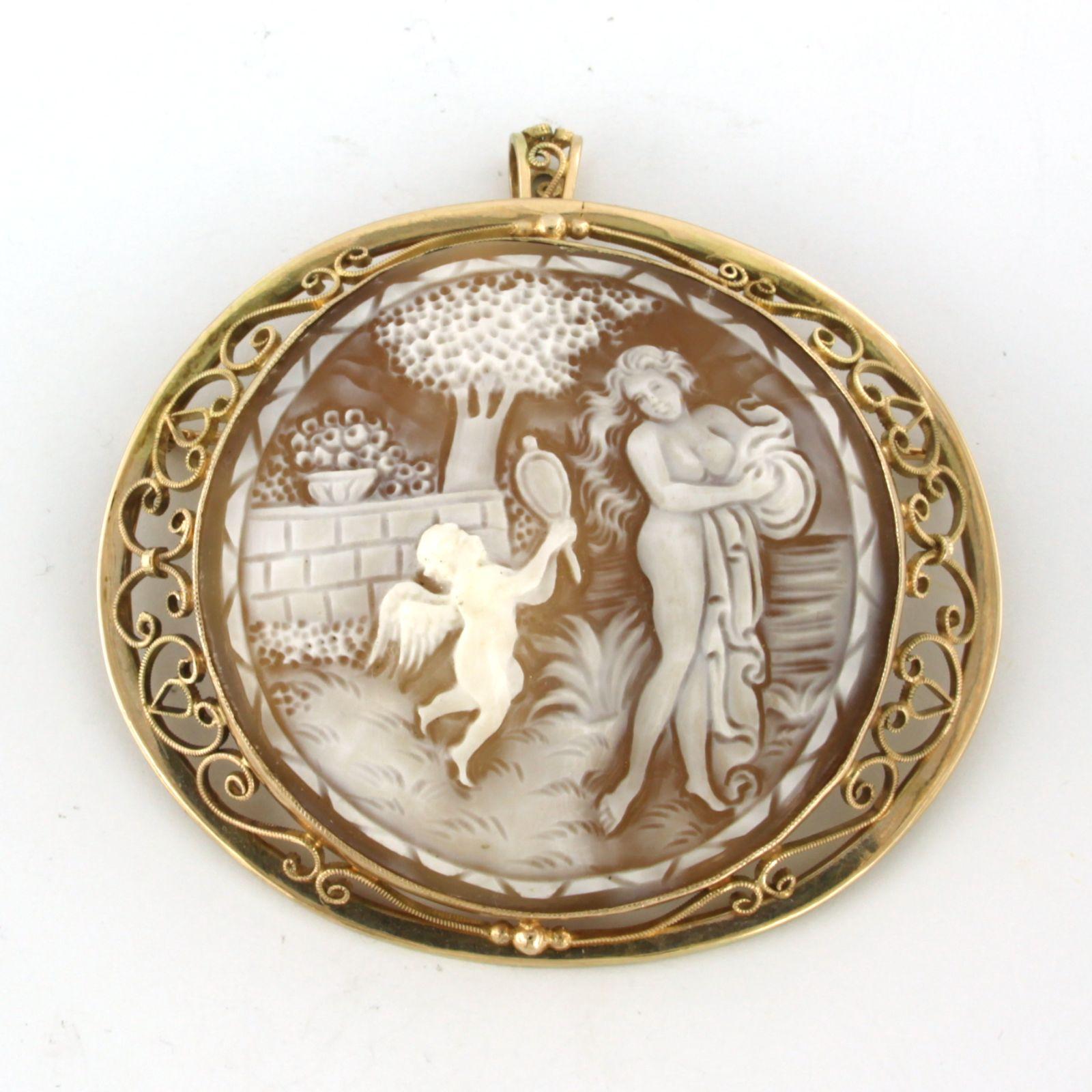 14k yellow gold cameo brooch/pendant – size 6.4 cm x 6.6 cm

Detailed description

the size of the brooch/pendant is 6.4 cm long by 6.6 cm wide

weight 29.8 grams

set with

- 1 x 4.9 mm x 4.7 mm oval cut cameo

Color brown/white
Purity….
Gemstones