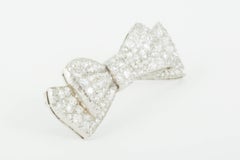 Bow Brooch, Platinum Mounted and Pave Set with Diamonds,  English circa 1920.