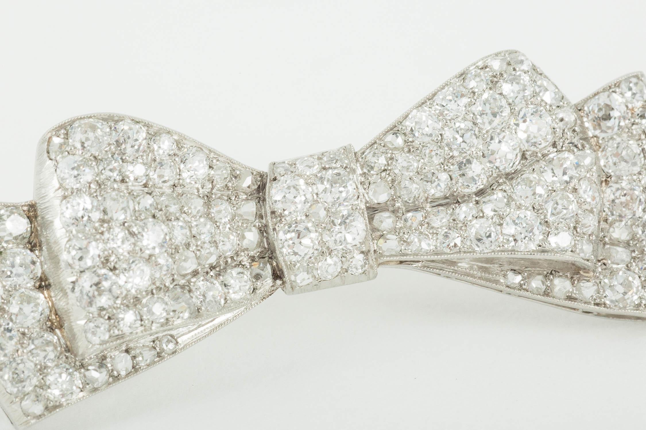 Edwardian  Bow Brooch, Platinum Mounted and Pave Set with Diamonds,  English circa 1920. For Sale