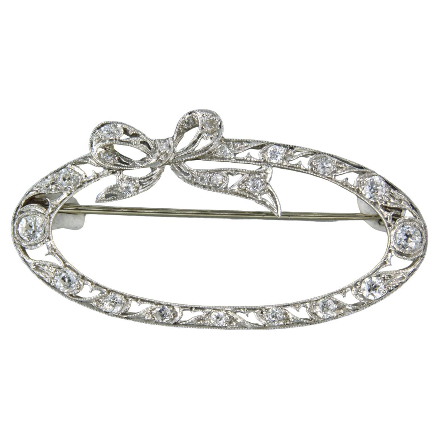 Brooch set with Diamonds, 14k white gold with platina