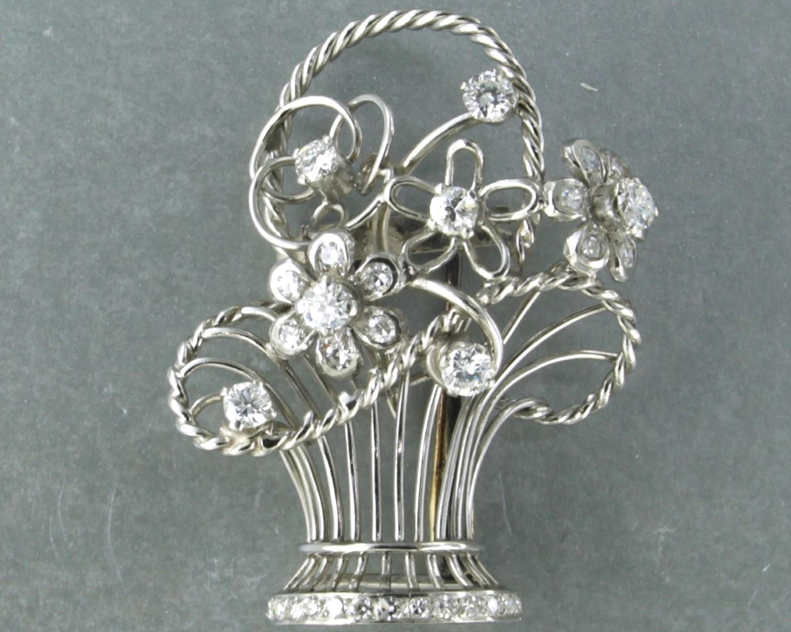 Platinum brooch set with brilliant and single cut diamonds totaling approximately 1.00ct – F/G – VS/SI

Detailed description

the size of the brooch is 3.6 cm by 3.0 cm wide

weight 10.4 grams

set with

- 7 x 2.7 mm brilliant cut diamond,
