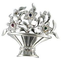 Brooch set with Emerald, Ruby and Sapphire and diamonds , 18k white gold