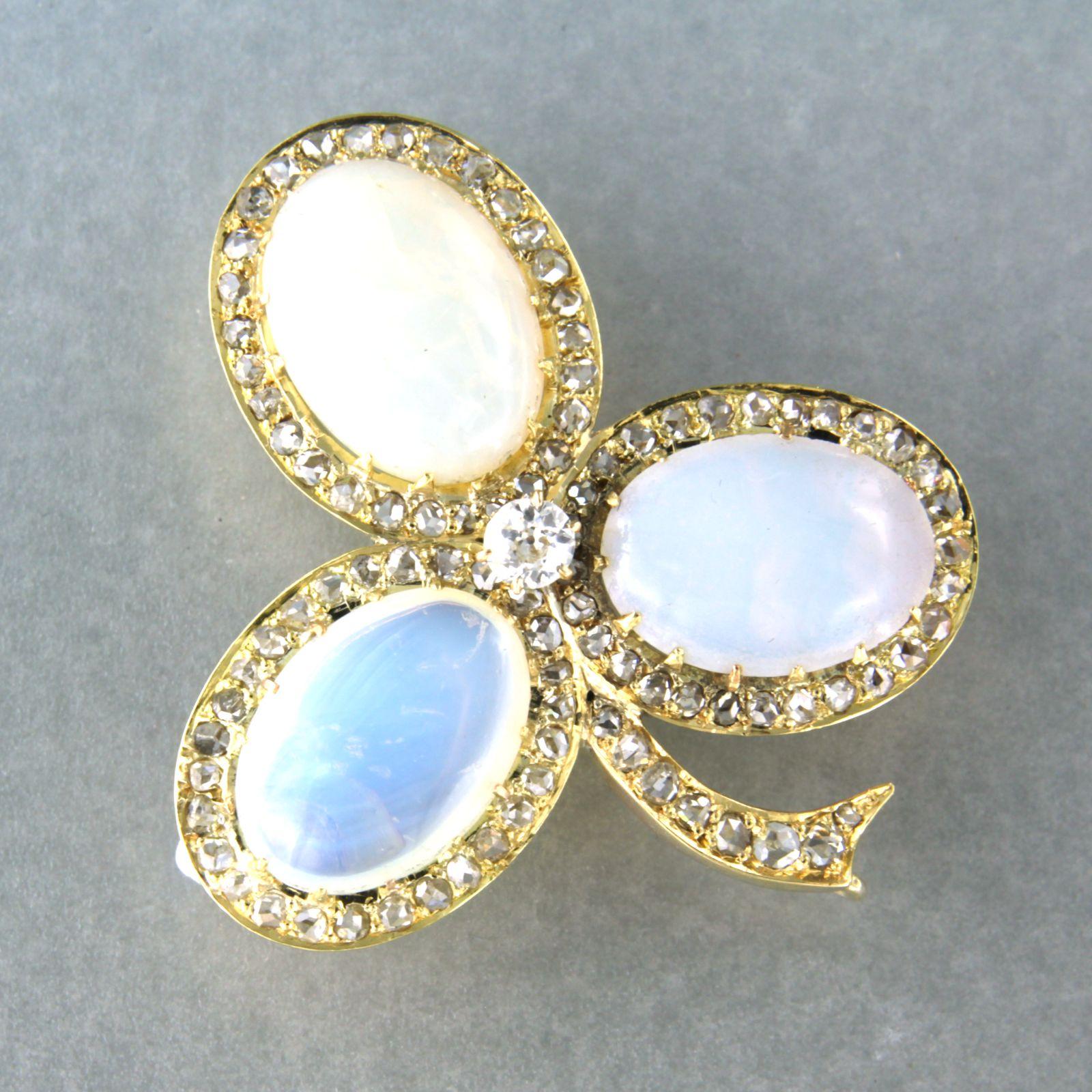 Modern Brooch set with opal and diamonds up to 1.30ct 14k yellow gold For Sale