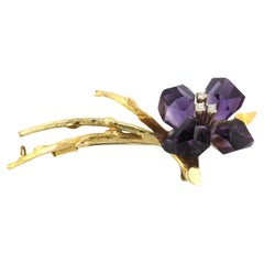 Brooch with amethyst and diamonds 18k bicolor gold