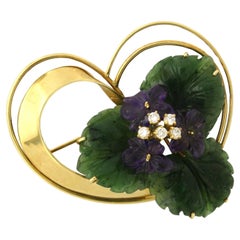 Brooch with Amethyst, Jade and brilliant cut diamonds up to 0.25ct 18k gold