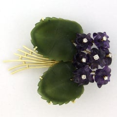 Brooch with amethyst, jade and brilliant cut diamonds up to 0.40ct 14k gold