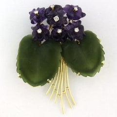 Brooch with amethyst, jade and brilliant cut diamonds up to 0.45ct 14k gold