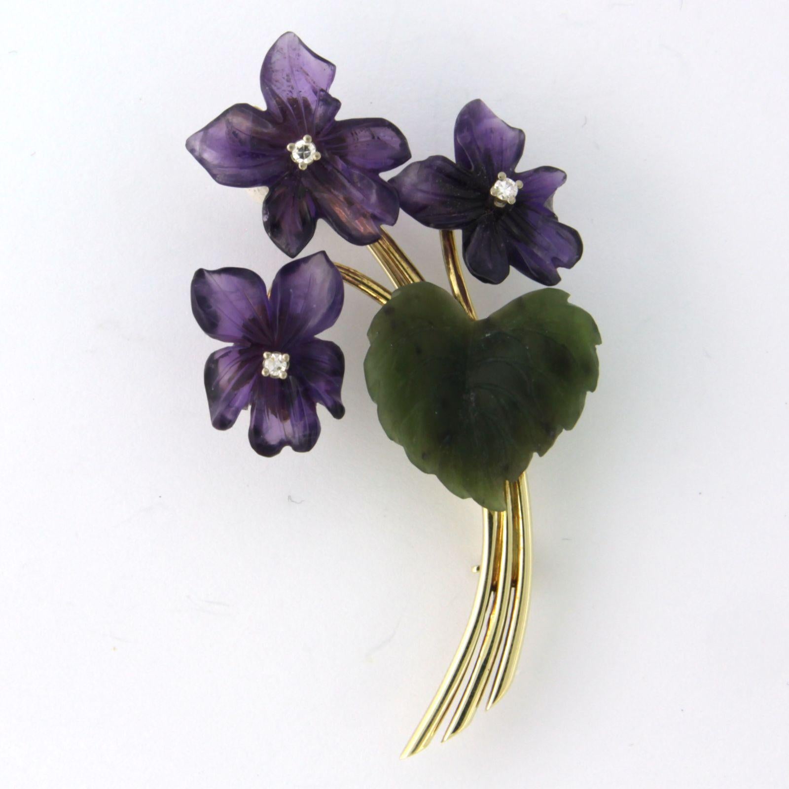 14k yellow gold brooch in the shape of a bunch of flowers, set with amethyst flowers, jade leaves and brilliant cut diamonds, 0.03ct in total - F/G - VS/SI

detailed description:

The size of the brooch is 5.0 cm long by 2.9 cm wide

weight: 7.7