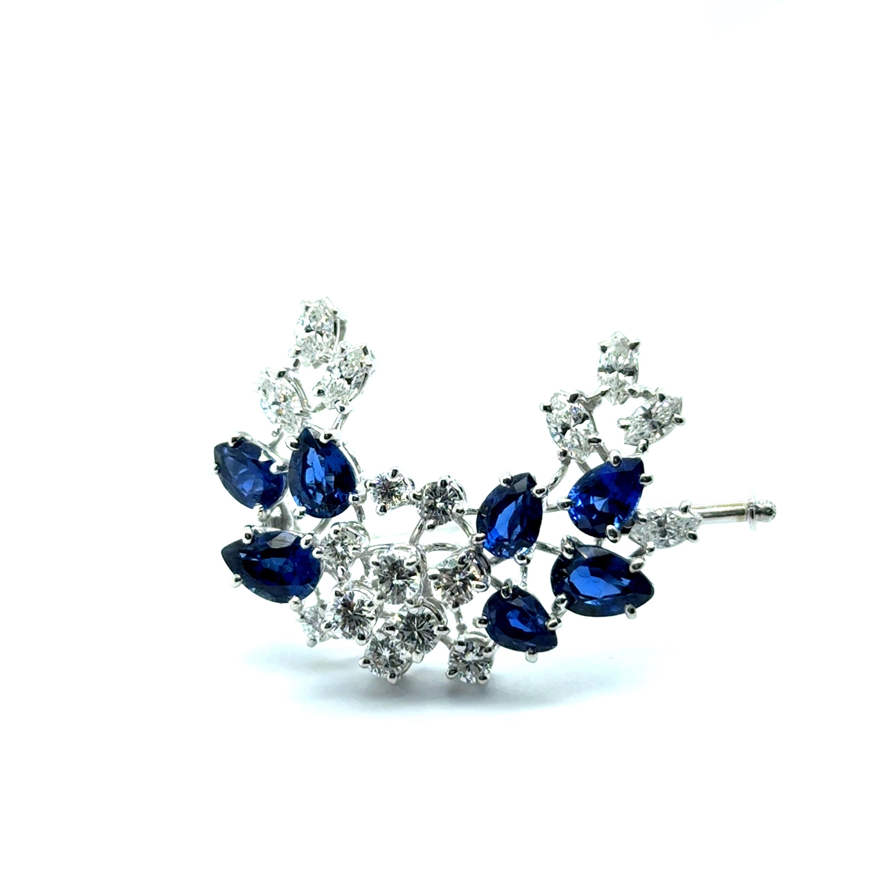 Like a soft whisper on a winter’s eve, this brooch in 18-karat white gold evokes the delicate beauty of a frozen branch.

At its heart, seven pear-cut sapphires, totaling 4.30 carats, are elegantly arranged, their deep, cool blue hues reflecting the