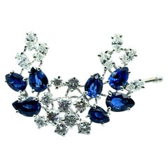 Brooch with Blue Sapphires and Diamonds in 18 Karat White Gold