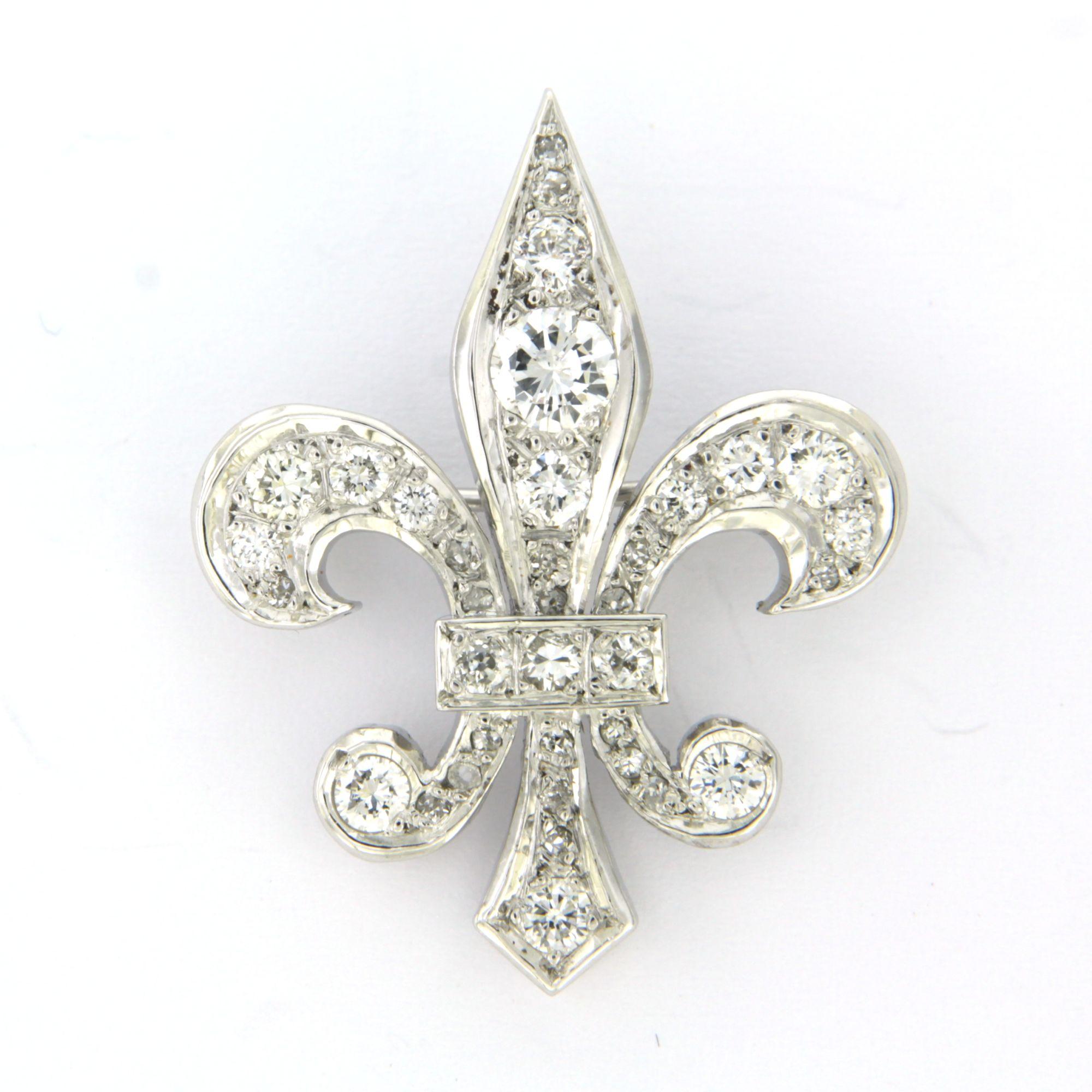 Broche avec diamants brillants et taille unique jusqu
à 0,70ct Or 18k 9,1 grammes