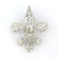 Spilla con diamanti a taglio brillante e singolo fino a 0,70 carati in oro 18 ct. 9,1 grammi Spilla con diamanti a taglio brillante e singolo fino a 0,70 carati in oro 18 ct. 9,1 grammi