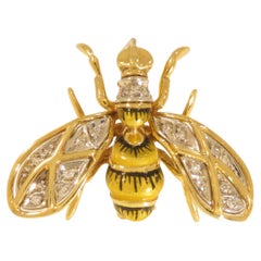 Spilla con diamanti e smalto in oro giallo e bianco