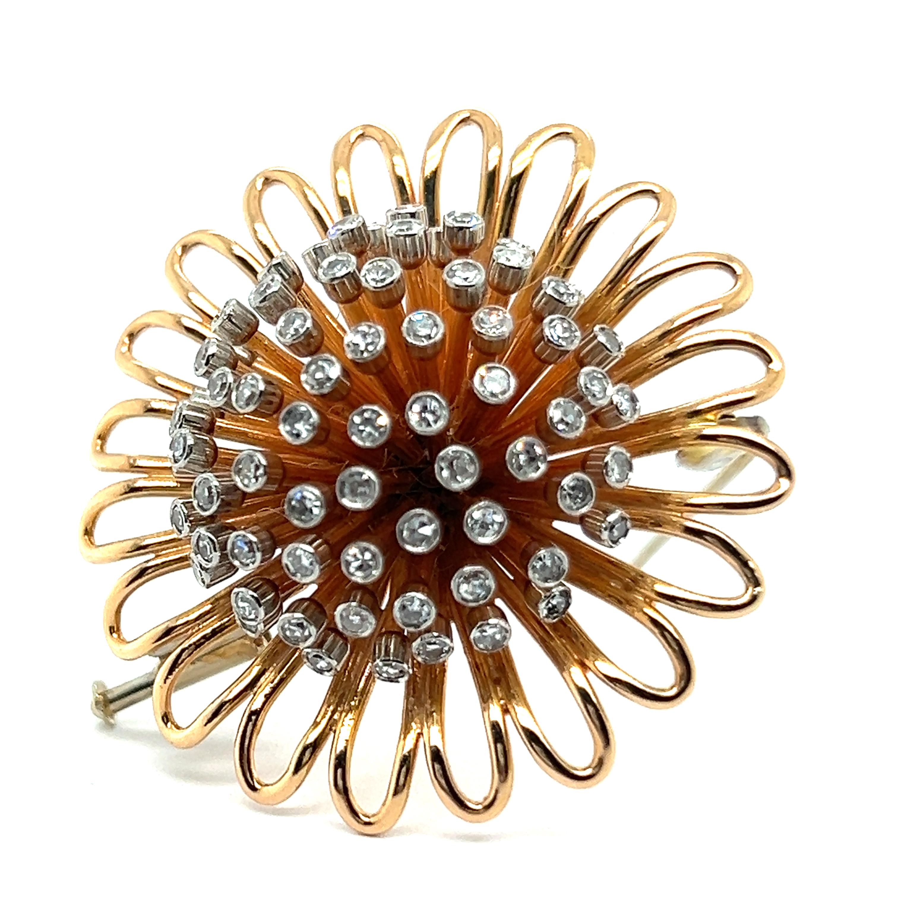 Presenting a striking brooch by the visionary Swiss jeweler Meinrad Burch-Korrodi. Crafted in 18 Karat red and white gold, it features 70 diamonds with an 8/8 cut, totaling 1.80 carats. 

Burch-Korrodi's innovative approach transforms the