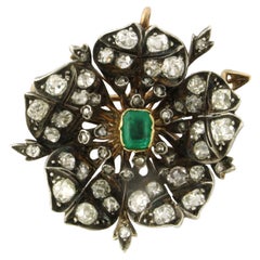 Brooch with emerald, old and rose cut diamonds up to 5.00ct 18k gold and silver