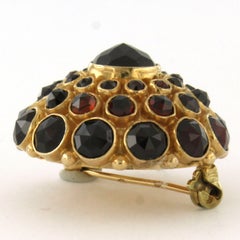 Broche avec grenat 14k or rose 8,9 grammes