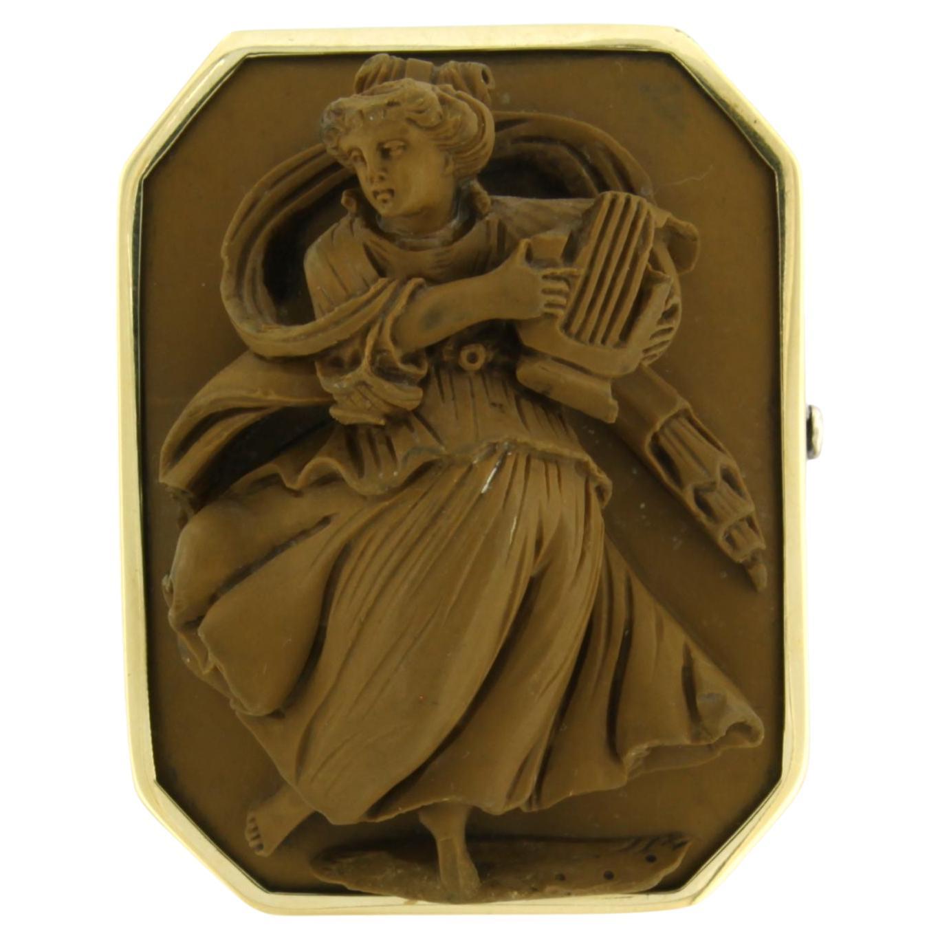 Brooch with lava cameo 14k yellow gold and silver