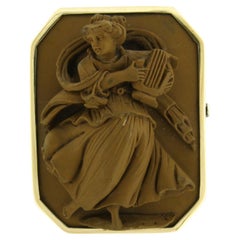 Brooch with lava cameo 14k yellow gold and silver