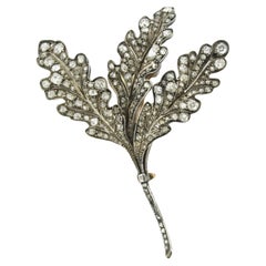 Broche avec diamants taille vieille mine jusqu'à 8,00 carats, or rose 18 carats et argent