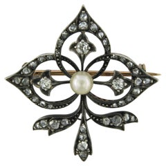 Brooch with pearl and diamonds 18k gold and 835 silver