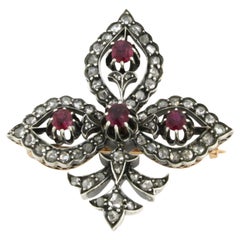 Brooch with ruby and rose cut diamond up to 0.50ct 12.5 gram 18k gold and silver