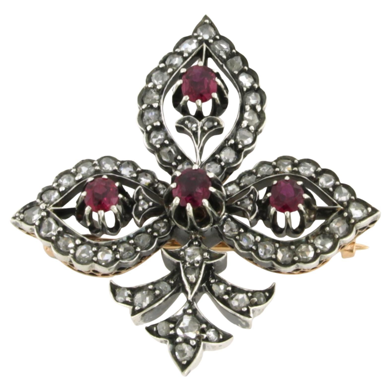 Brooch with ruby and rose cut diamonds up to 0.50ct 18k gold and silver