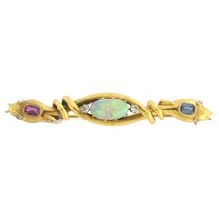 Brosche mit Rubin, Saphir, Opal und Diamant aus 18 Karat Gelbgold