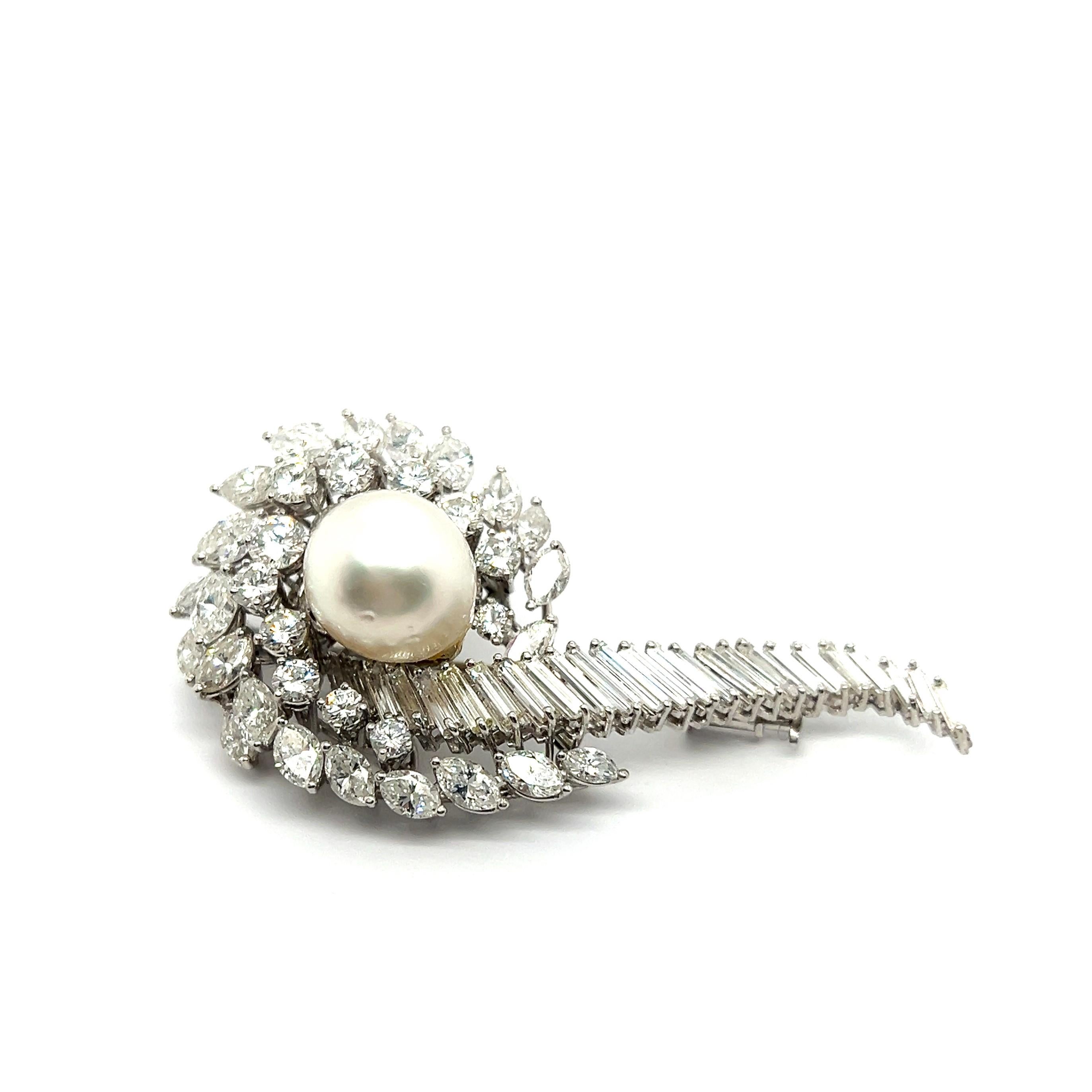 Radiating ethereal allure, this platinum brooch combines the natural beauty of pearls and enchanting sparkle of diamonds, creating a captivating tale of timeless elegance.

At the heart of this piece, a luminescent South Sea Cultural Pearl reigns,