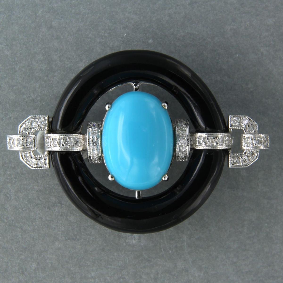14k white gold brooch set with synthetic turquoise, onyx and brilliant cut diamond up to 0.24ct - F/G - VS/SI

detailed description:

the size of the brooch is 3.7 cm wide and 2.6 cm high

weight 7.9 grams

Set with:

- 2 x 2.4 cm x 4.2 mm half