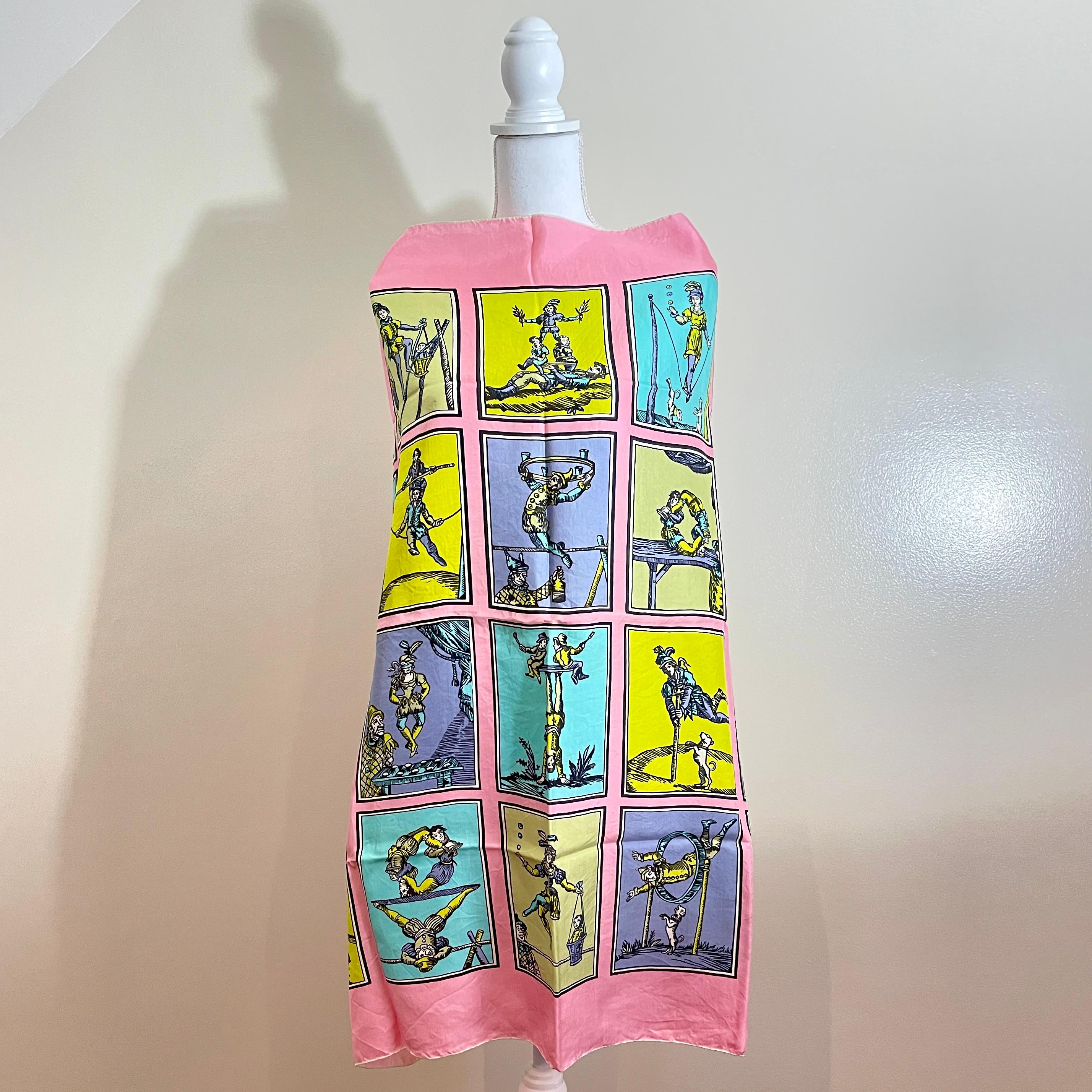 
Brooke Cadwallader Silk Scarf, The Carnival Print – 1947-1950

Brooke Cadwallader was a well-known printed textile designer of the mid-20th century. His whimsical prints drew on the interests of a country in and out of war and were used on scarves,