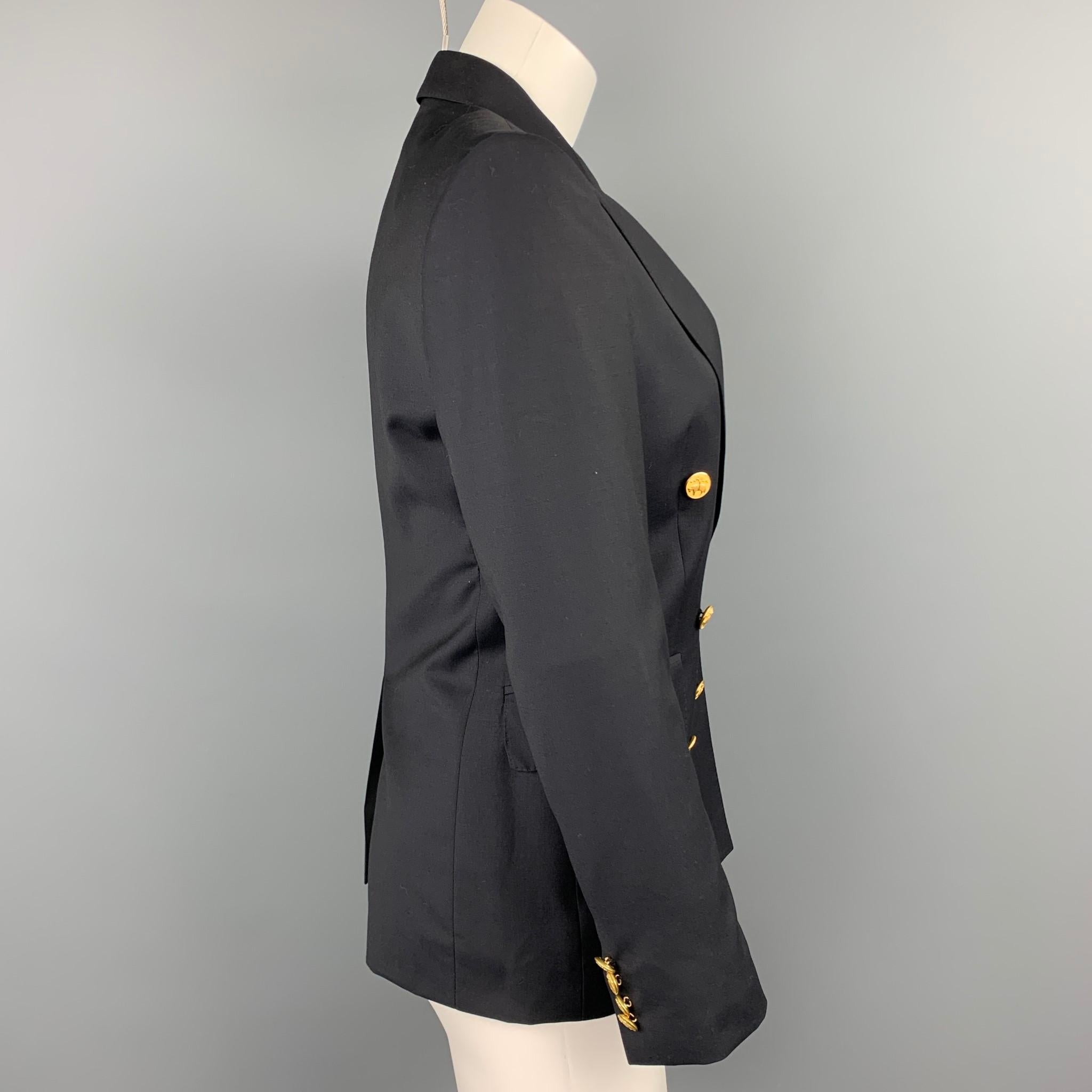 BROOKS BROTHERS by LORO PIANA blazer comes in a navy wool with a full liner featuring a peak lapel, flap pockets, and a double breasted closure. Made in Italy.

Very Good Pre-Owned Condition.
Marked: 2
Original Retail Price: