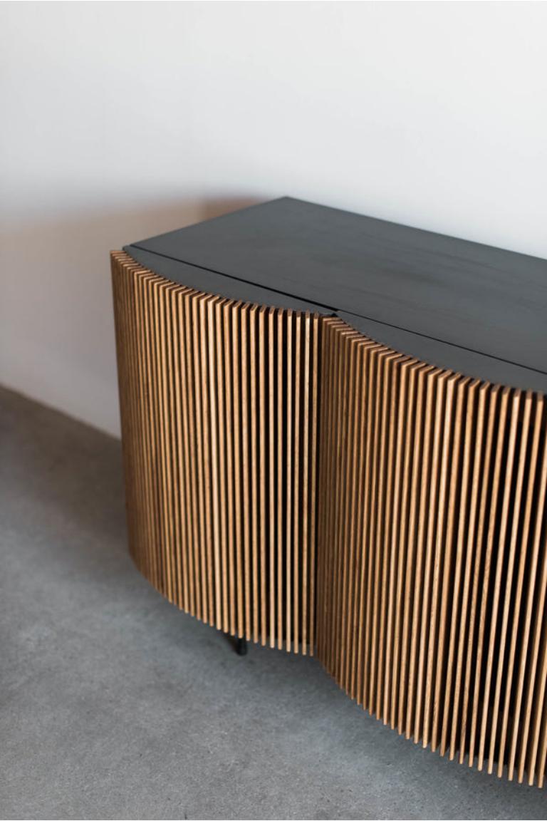 The Brooks Credenza is handmade locally in Los Angeles, California. The refined design of the piece draws its original aesthetic through the combination of classic metal casing and carefully assembled oak facing. The industrial steel casing, a