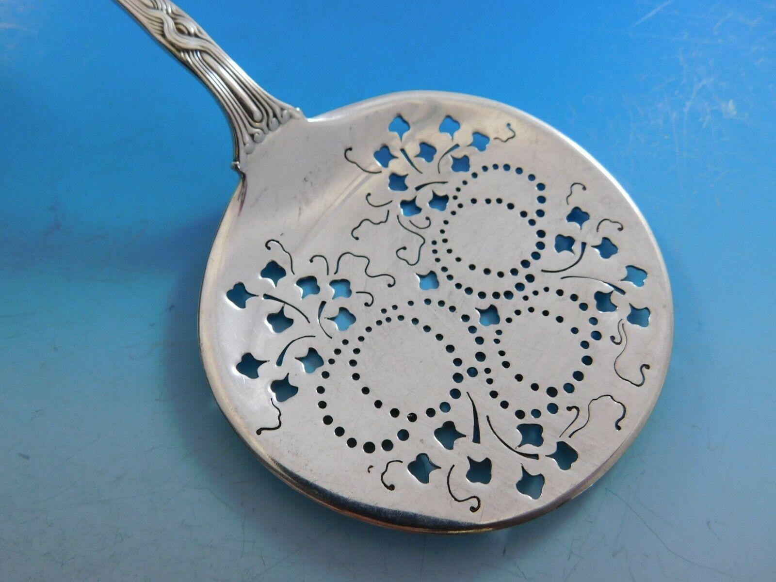 Sterling silver tomato server, pierced with leaves, 7 3/4