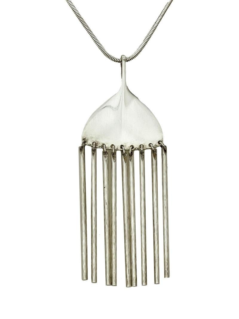 Broom pendant, necklace by Bent Gabriëlsen for Georg Jensen, Denmark 1960s

A broom pendant with slightly hammered round shaped rods, hanging from eyelets. Fully hallmarked with the Danish silver hall marks. Design no. 142. 925 Sterling silver,