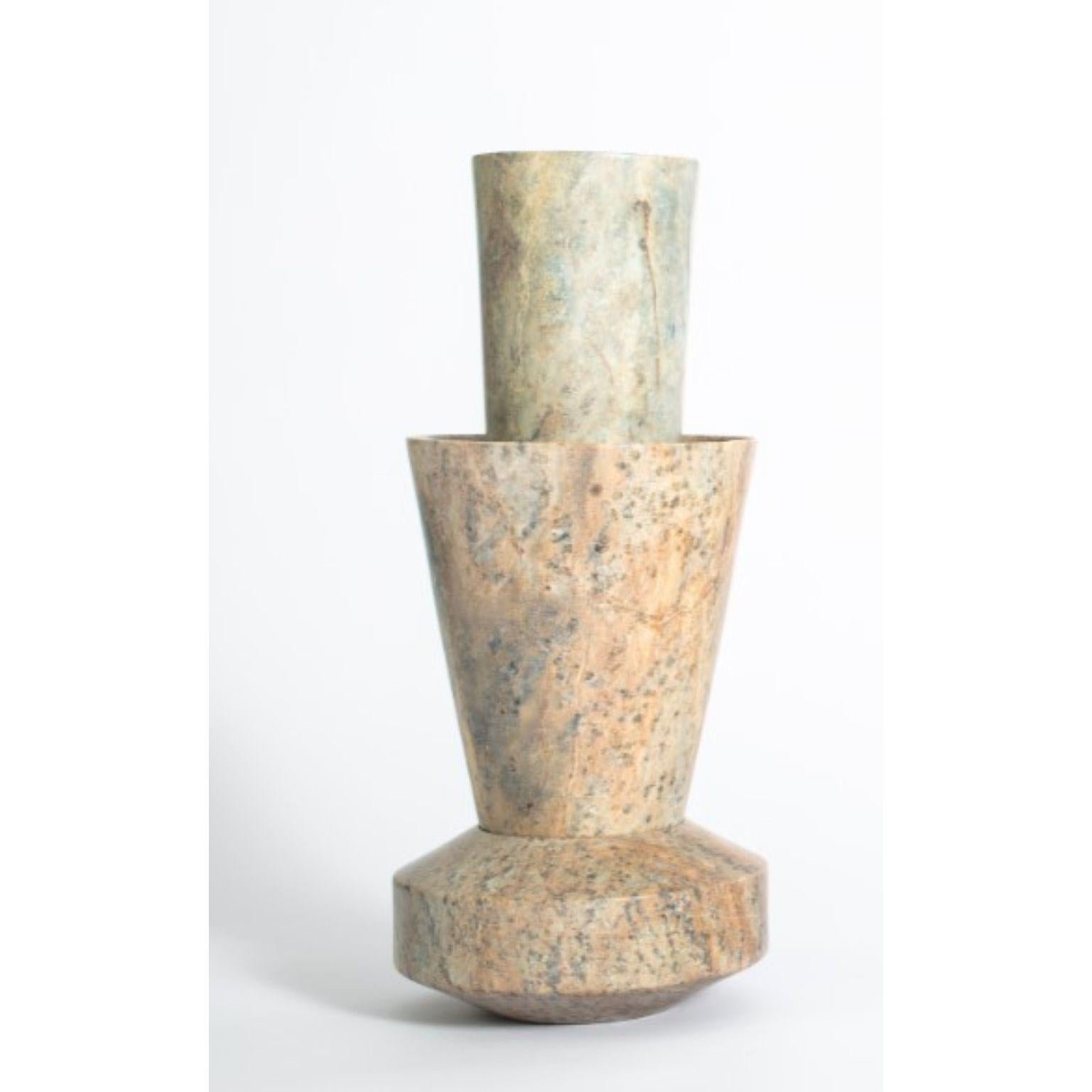 Brota 3 - Soapstone vase by Alva Design
Materials: Soapstone
Dimensions: 15 (Ø) x 40 (H)

ALVA is a furniture and objects design office, formed by brothers Susana Bastos, artist and designer, and Marcelo Alvarenga, architect. Their projects are