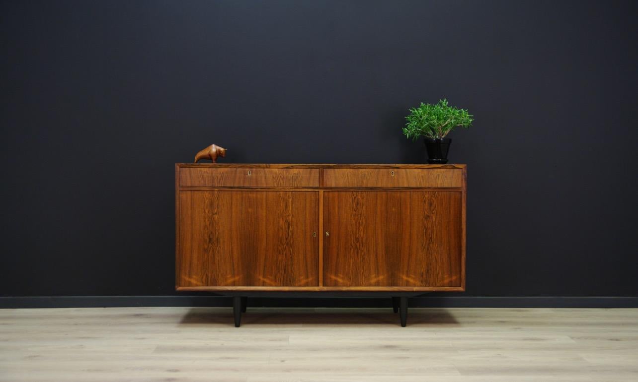 Classic cabinet from the 1960s-1970s, Scandinavian design, produced in the Brouer Møbelfabrik manufacture. The surface is veneered with rosewood, has two drawers and interior with shelves. Preserved in good condition (small bruises and scratches) -