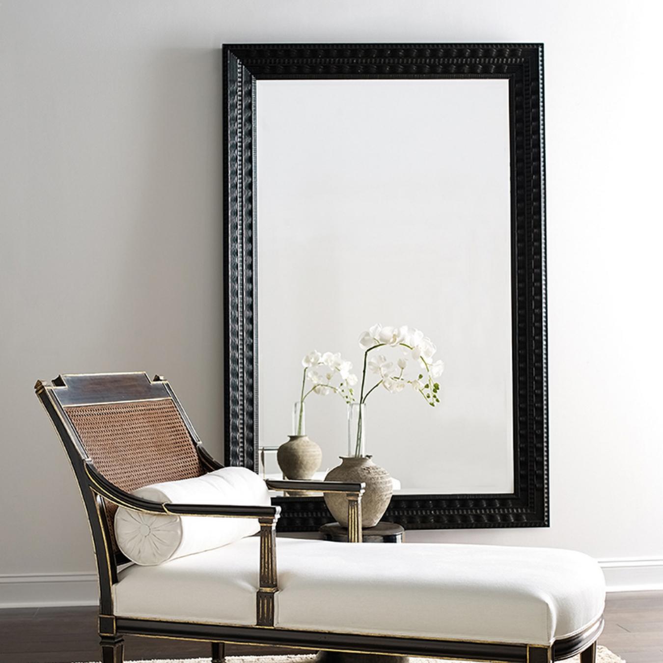 This rectangular mirror is made out of Dutch style moldings, with its dark wood finish it gives any space a sophisticated and simple look.
  