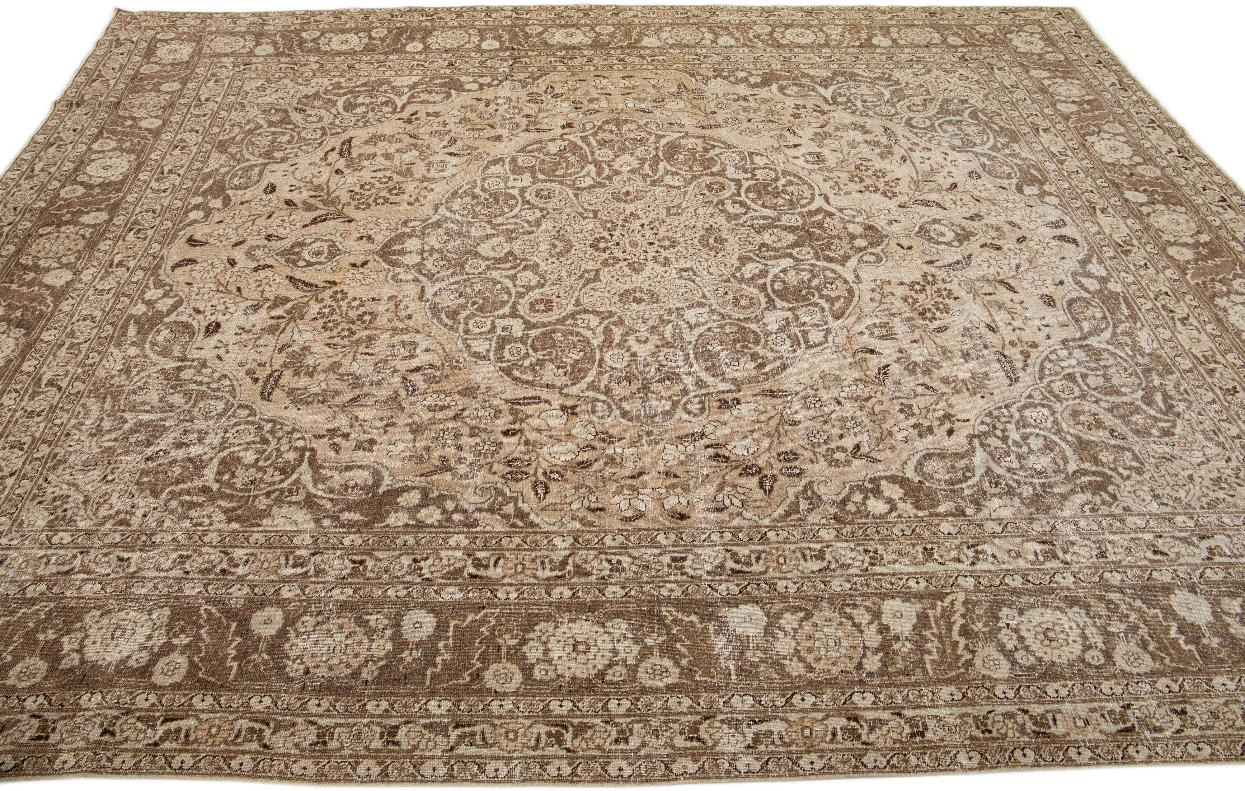 Brown 1920s Antique Persian Tabriz Handmade Wool Rug with Medallion Design In Good Condition For Sale In Norwalk, CT