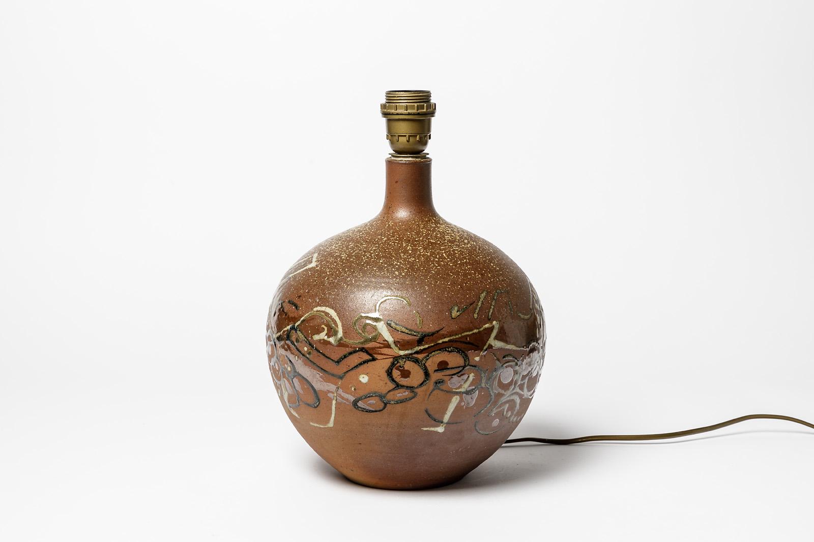 Annie Maume Héraud

Original brown stoneware ceramic table lamp.

Abstract ceramic glazes colors and brown ceramic.

Signed at the base

Realised circa 1970 in La Borne

Sold without lampshade

Ceramic dimensions : height : 30cm Large :