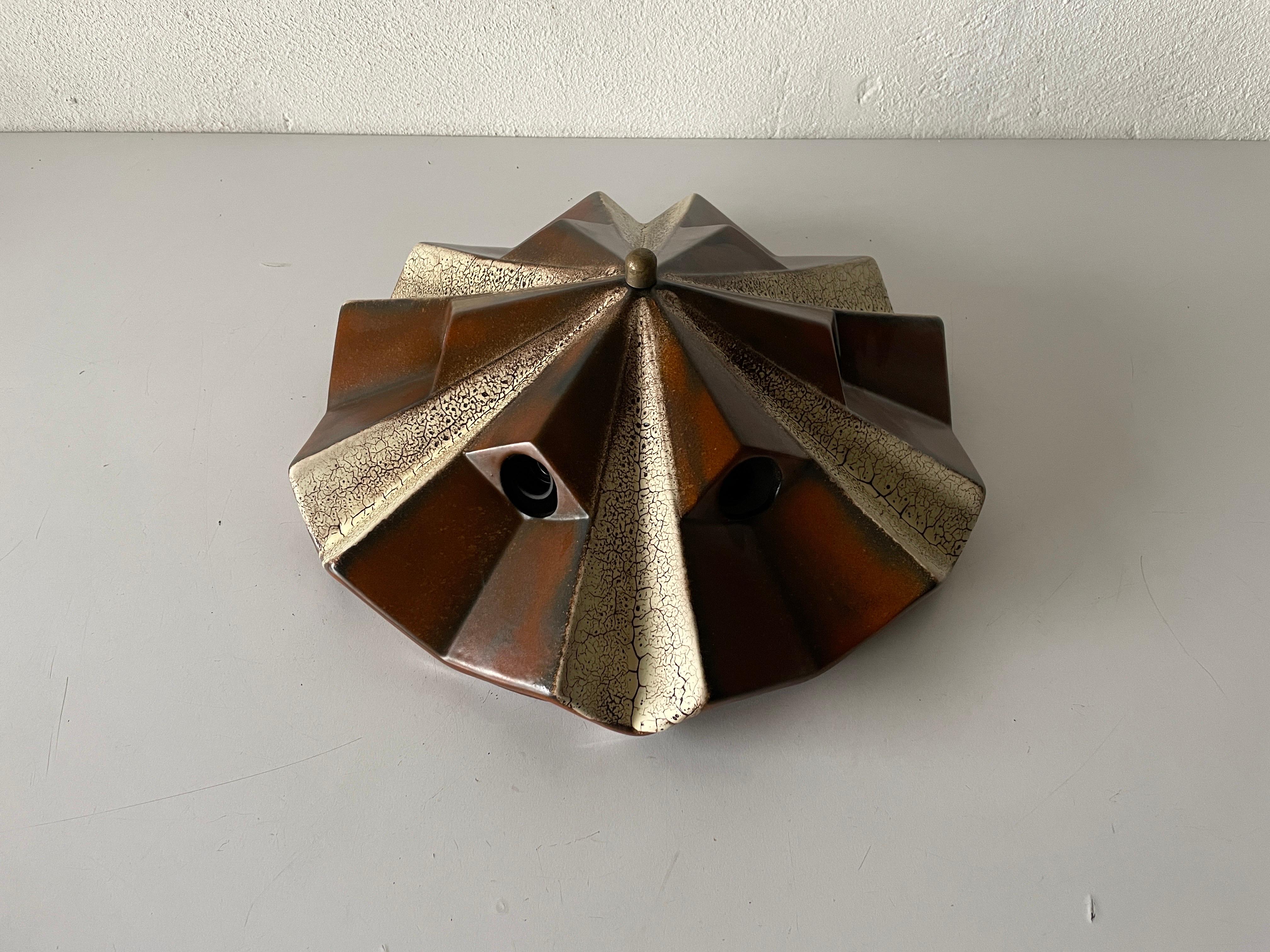 Brown and beige ceramic ceiling lamp by Pan Leuchten, 1970s, Germany

Sculptural very elegant rare design flush mount. 

It is very ideal and suitable for all living areas.


Lamp is in good condition. No damage, no crack.
Wear consistent