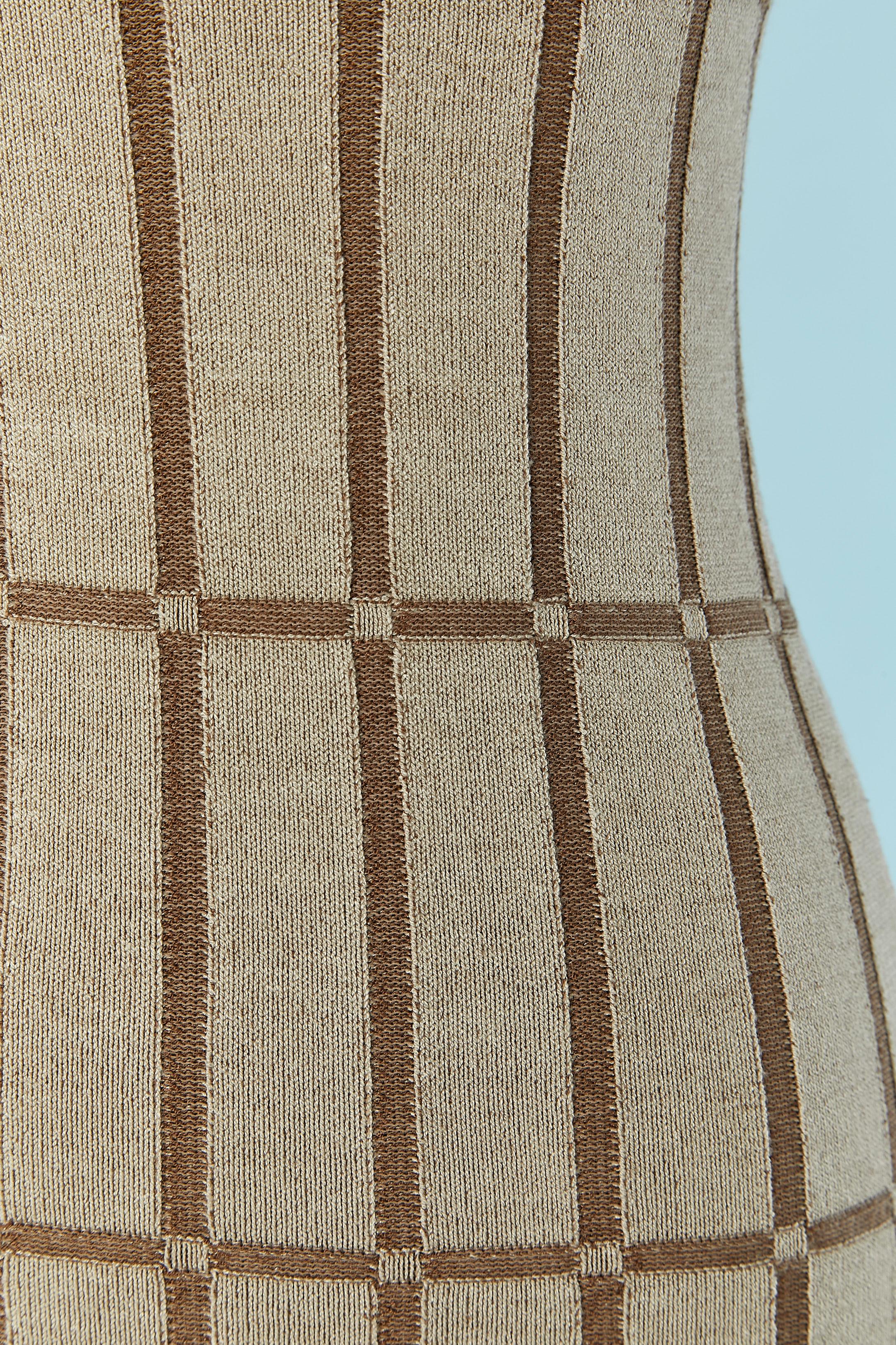 Vestido slip marrón y beige. Composición del tejido: 85% rayón, 12% nailon, 2% elastán
TALLA 34 (Fr) XXS