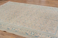 Brown and Blue Oushak with Floral Border and Bits of Blue