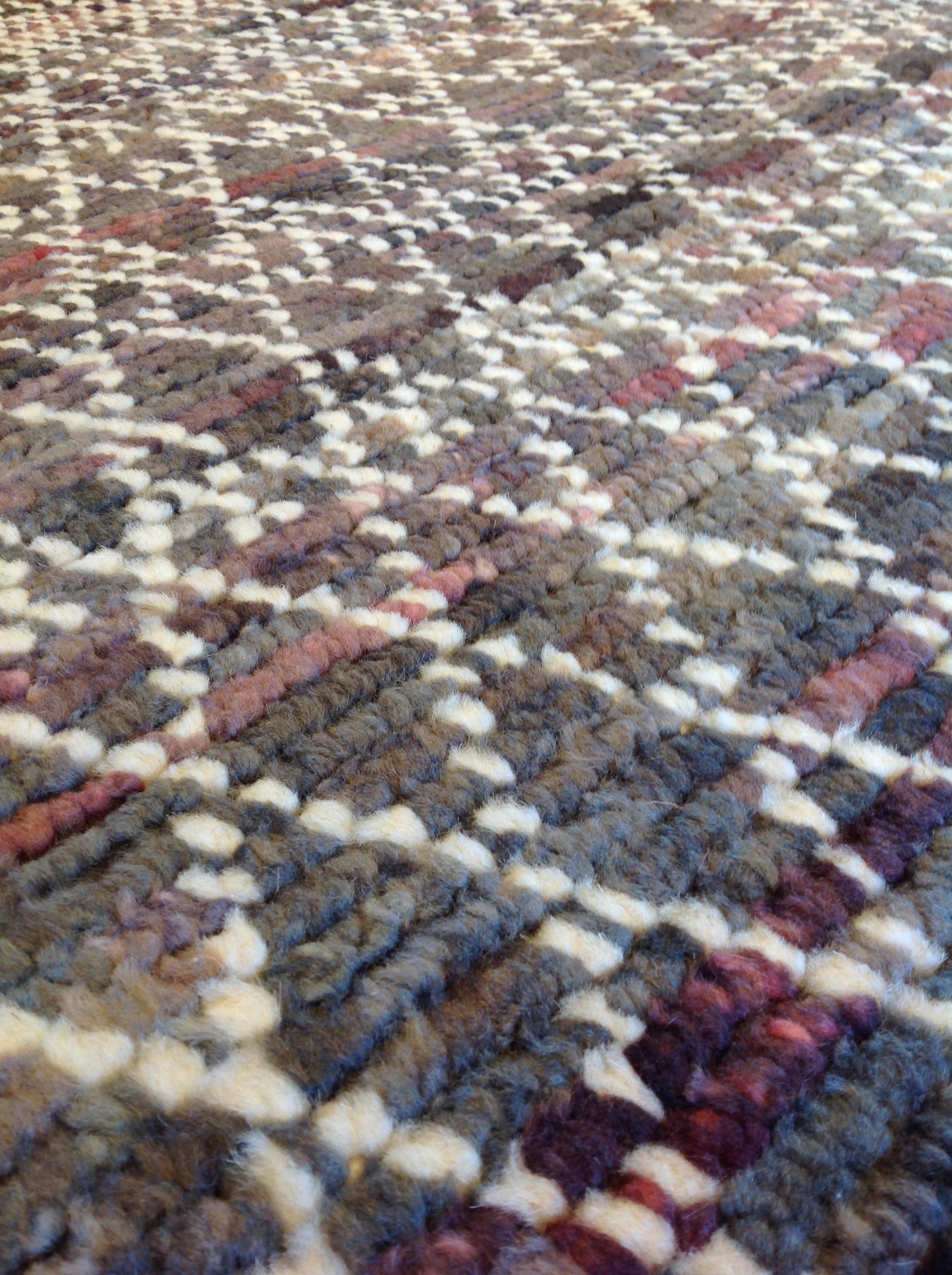 brown and burgundy rug