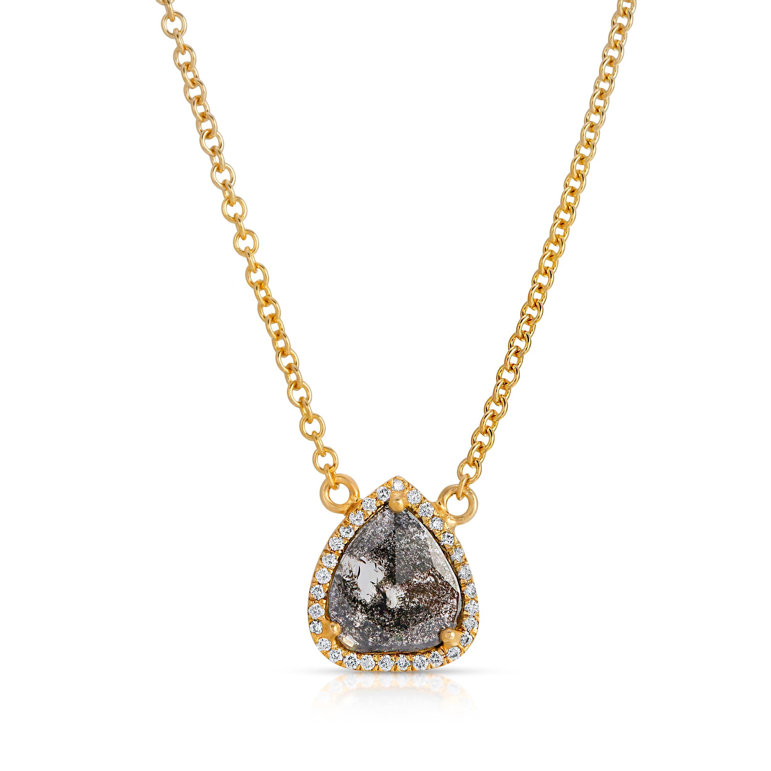 This sweet 1.01ct Petite Black and Clear Rustic Diamond Teardrop Pendant is set with .16ct vs quality Diamond Pave in 18k with Matte Finish Yellow Gold on an 18” !8k Yellow Gold chain.  It is handmade in Los Angeles. All Diamonds are ethically