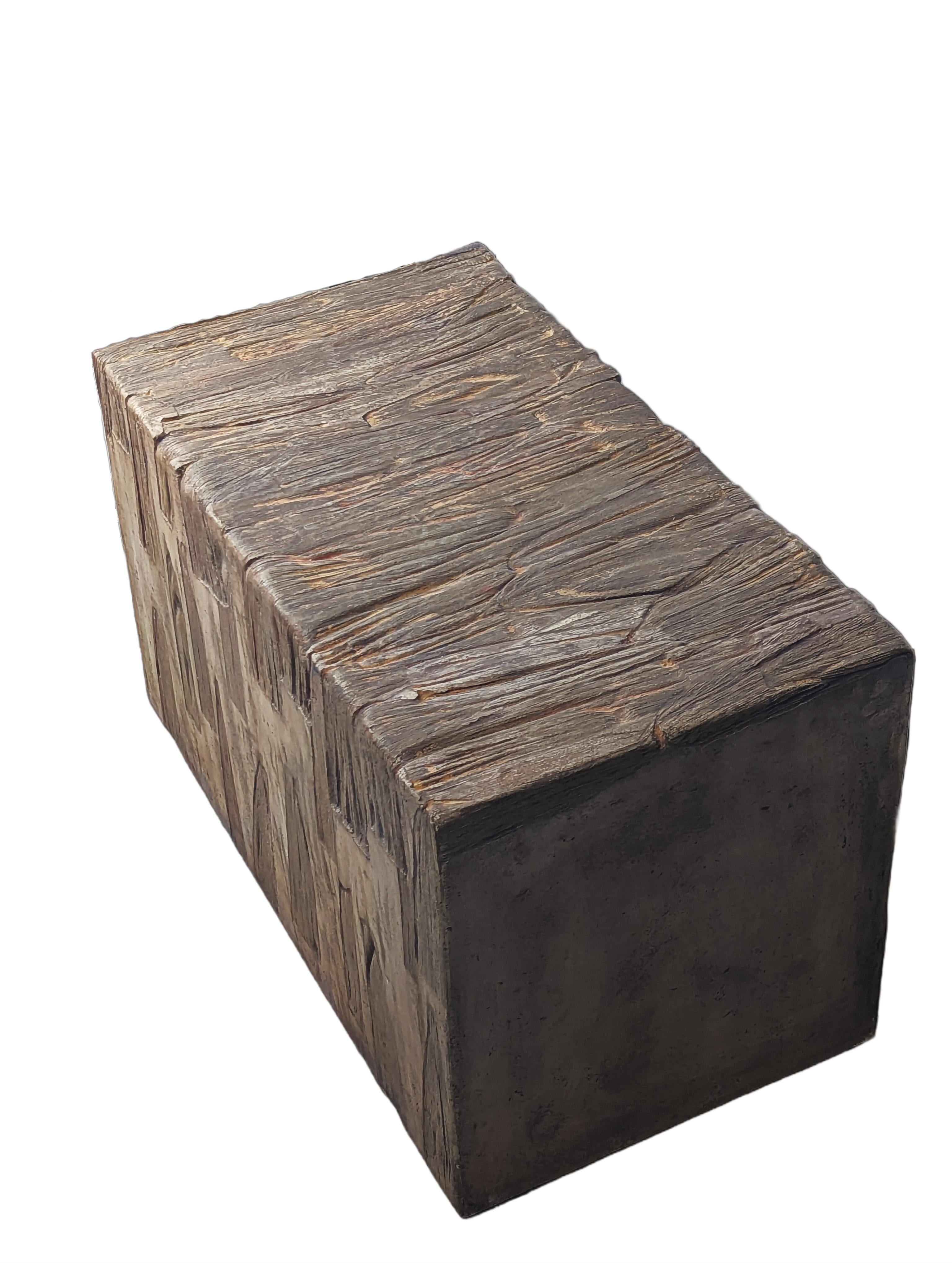 One of a kind, contemporary and rustic concrete bench or coffee table with dozens of corn husk impressions with brown, grey, copper, and blue tones. Organic texture is prominent but not rough, providing great visual and tactile interest. Would
